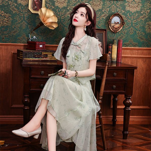 Close-up of floral embroidery on qipao top and skirt set